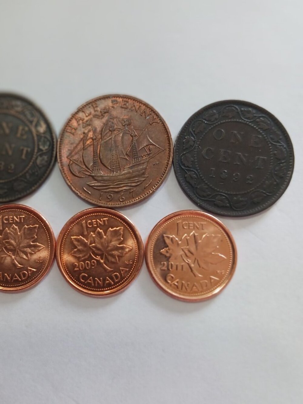 Canadian Small pennies uncirculated. ! Ha-penny, and 2 large pennies
